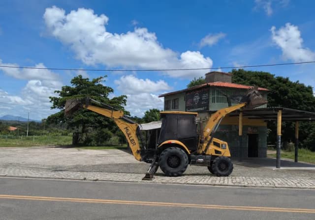 Retroescavadeira Muller Advance MR406